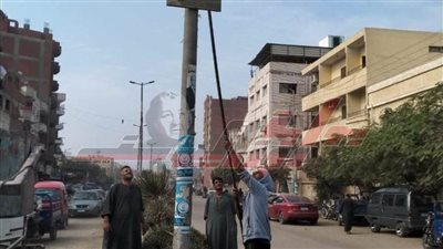 رفع وإزالة اللافتات والإعلانات غير المرخصة بأشمون 