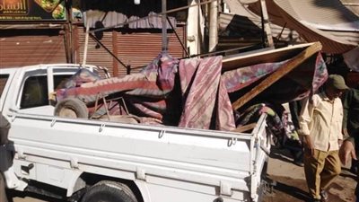 حملة لرفع الإشغالات والتعديات بالميادين العامة والطرق بمدينة أرمنت بالأقصر