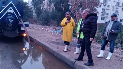 أول أيام العام بالقاهرة شفط مياه الأمطار