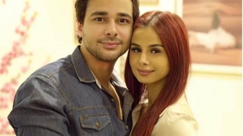 منه عرفة وزوجها