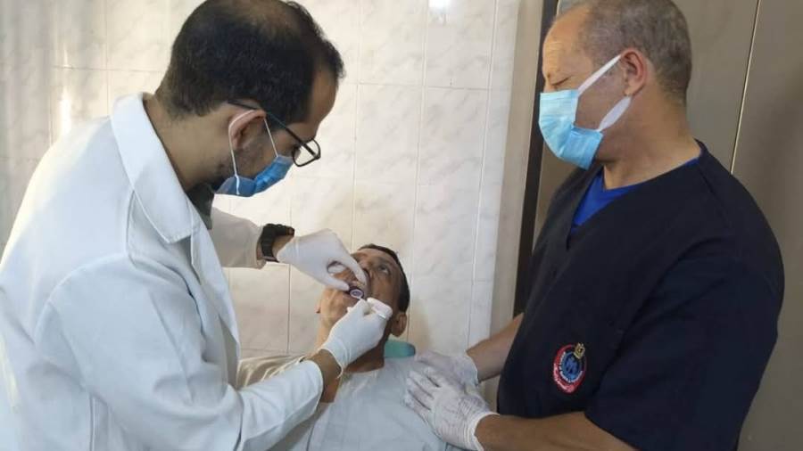 توقيع الكشف الطبي على المرضى