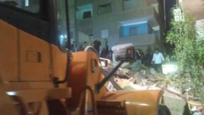 انتشال أول جثة من ضحايا العقار المنهار بشبرا الخيمة 