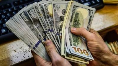 شركتا الأهلي ومصر للصرافة تجذبان حصيلة تبلغ 5ر4 مليار جنيه منذ تحرير سعر الصرف