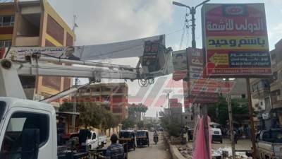كفر الشيخ تزيل الإعلانات المخالفة بالحامول لتحسين المظهر الحضاري